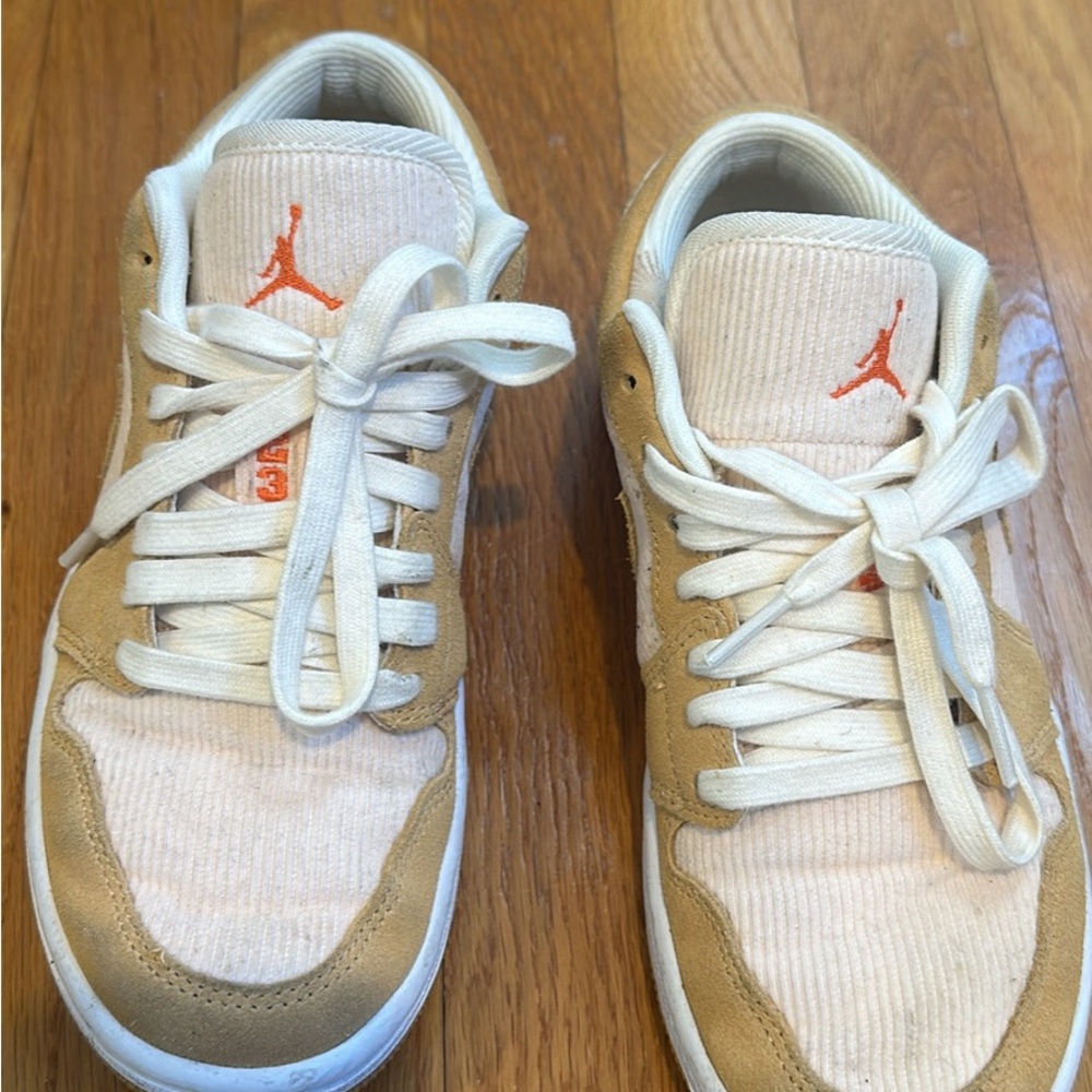 Jordan Women's Sneakers in light pink with tan accents